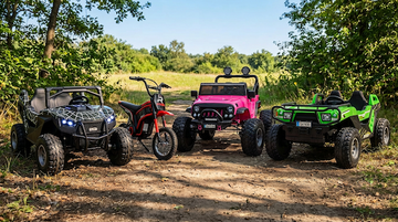 four ride on toys for kids together outdoors on dirt road