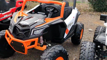 orange ride on utv on offroad terrain